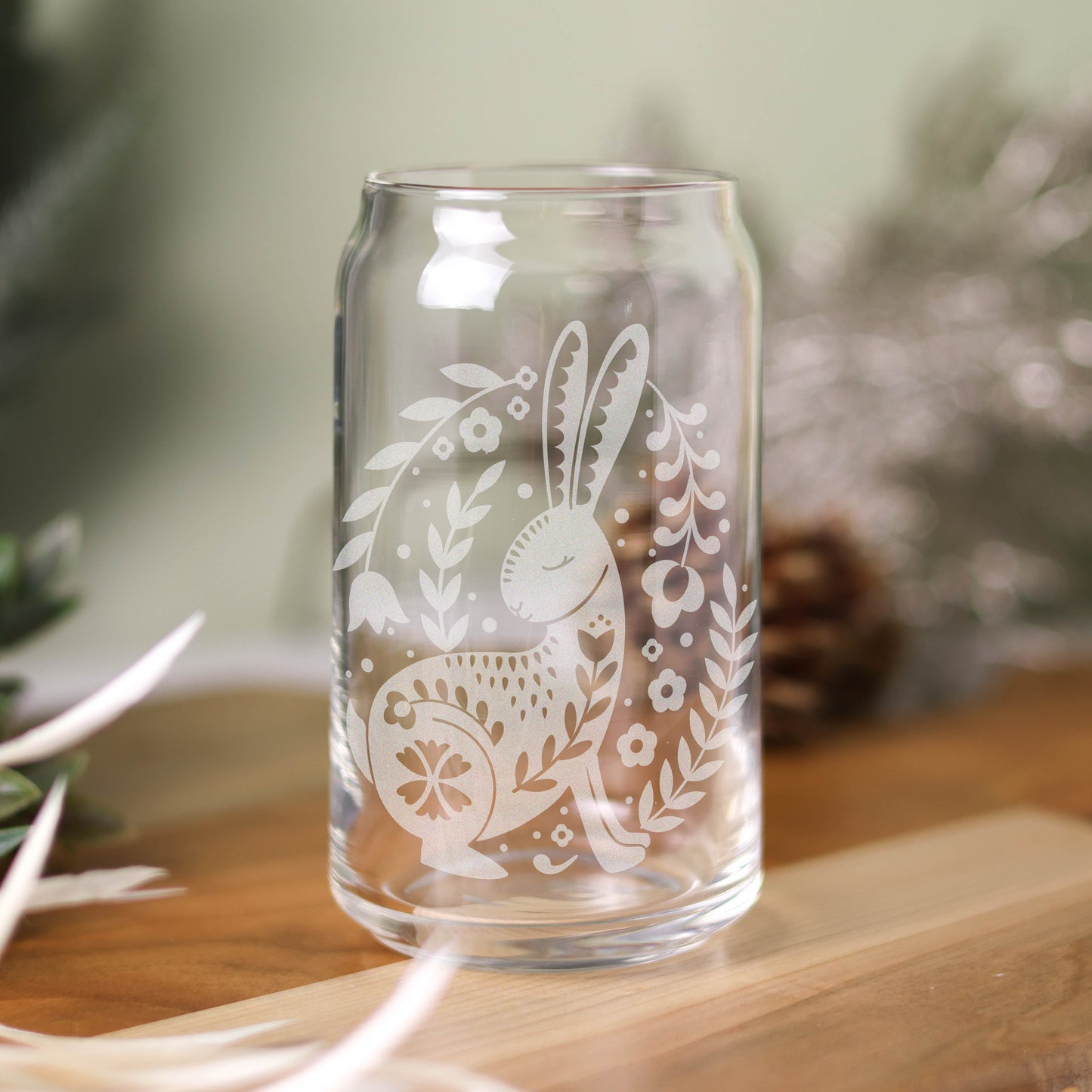 16 oz can glass with Scandinavian design featuring rabbit and florals