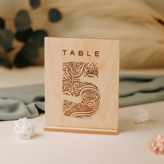 Table number sign made from solid maple hardwood featuring a decorative and ornate number font.